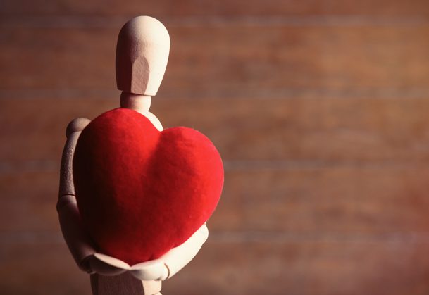 How does the influence of love compassion and giving back contribute to cultivating a benevolent world?
