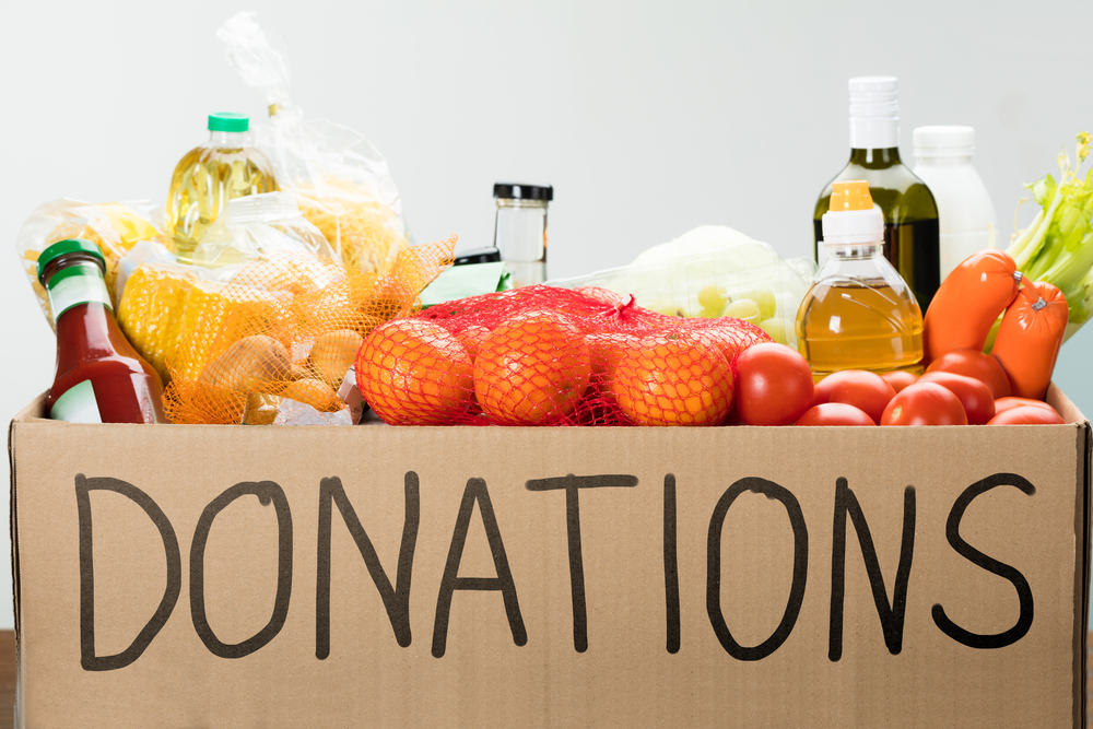 How does food donation, or Nishkayakarma, bring about transformation?