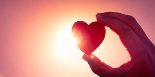 How does embracing compassion lead to attaining the divine?