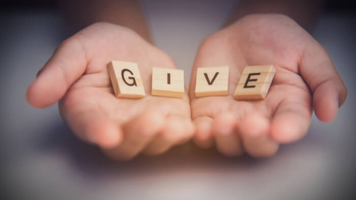How does embracing selflessness lead to divine grace?