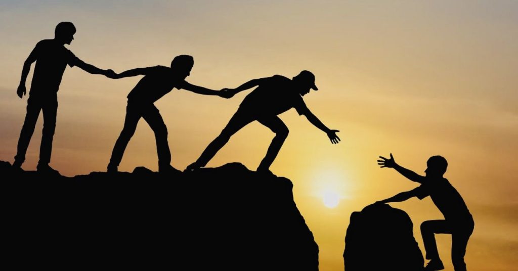 How does aiding others lead to life transformation through compassion?
