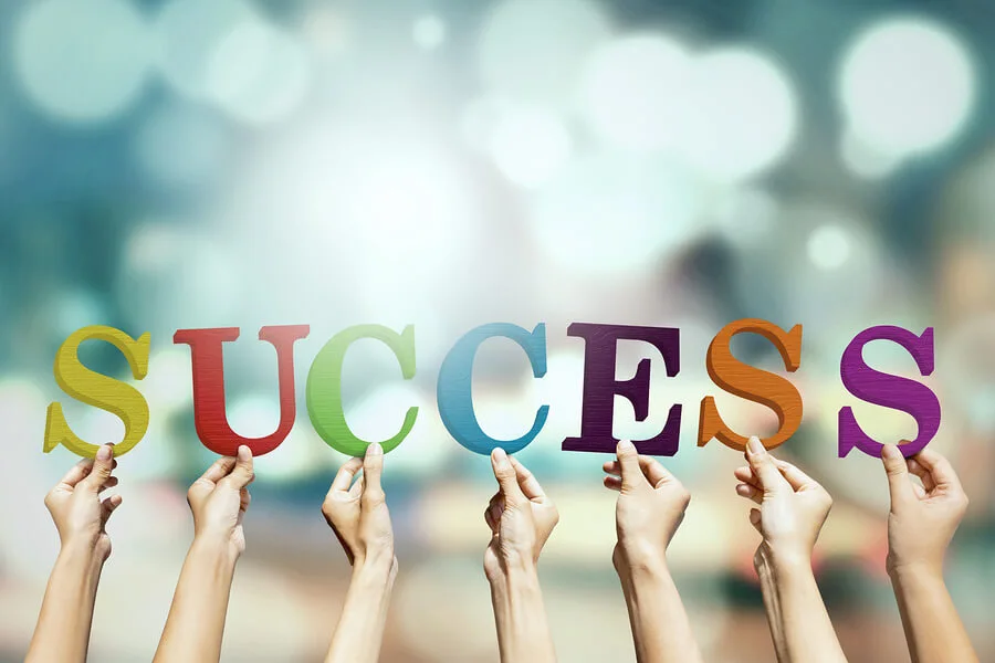 How can compassion and character lead to unlocking success?