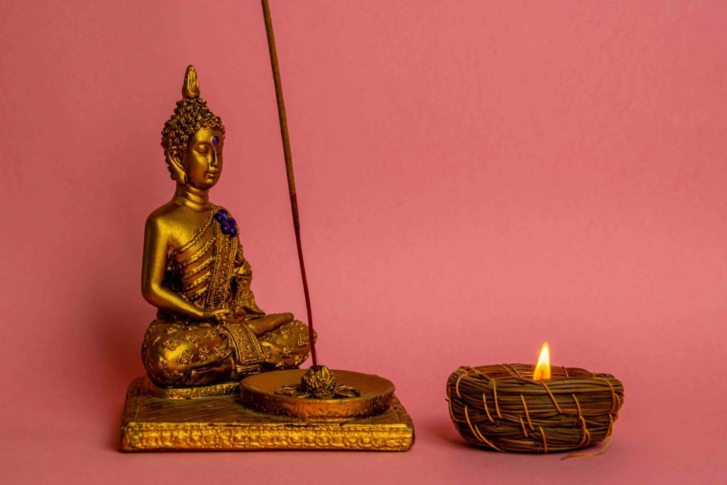 What is the essence of a guru in illuminating darkness with light?