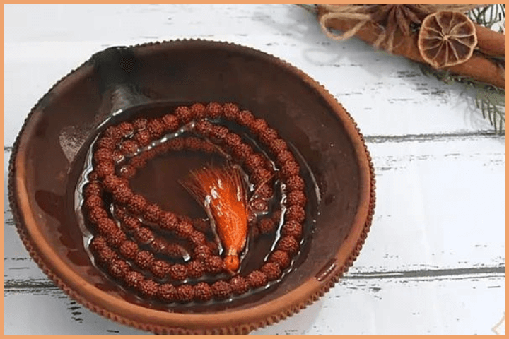 Clean the Mala with Water or Milk Regularly for Maintaining its Purity