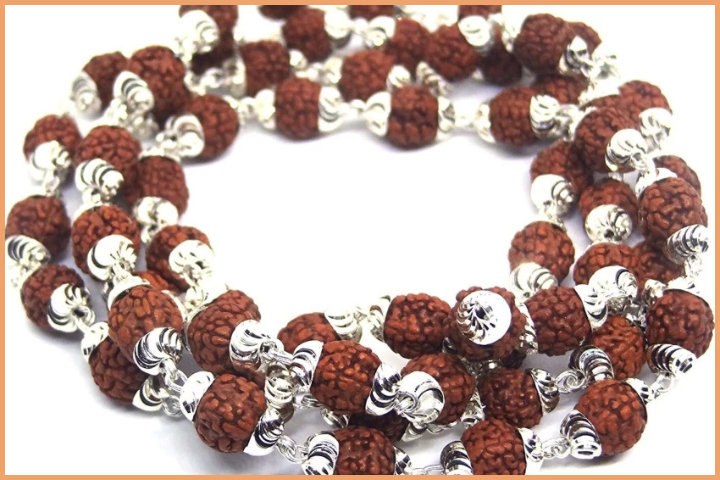 Use soft brush to clean the silver-cased rudraksha mala