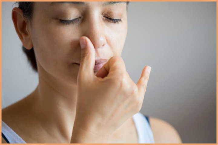 Slowly breathe in while chanting the Mantra