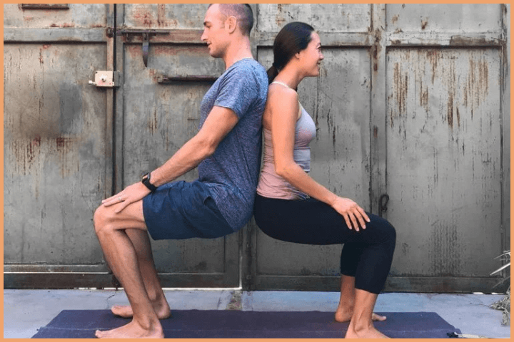 Couple Yoga Poses - Back to Back Chair Pose